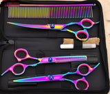 Pet grooming scissors set with colorful shears and comb for professional dog grooming.