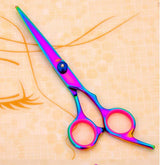 Pet grooming scissors in colorful design, ideal for professional pet grooming needs.